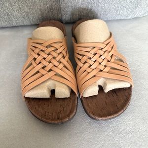Merrell District Mahana Slide in natural tan. Never been worn.